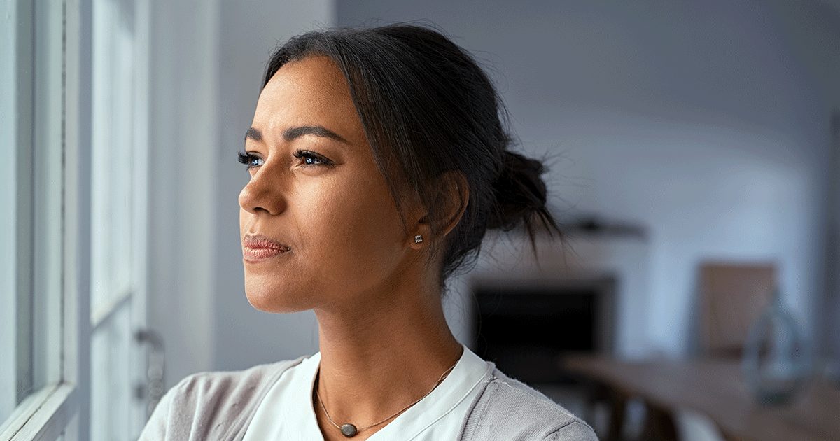 Woman thinking about surviving an abortion